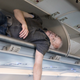 Illustration for article titled The Mischief Master Strikes Again! Bill Murray Surprised This Lucky Fan By Tumbling Dead Out Of The Overhead Bin After A 16-Hour Flight To Japan